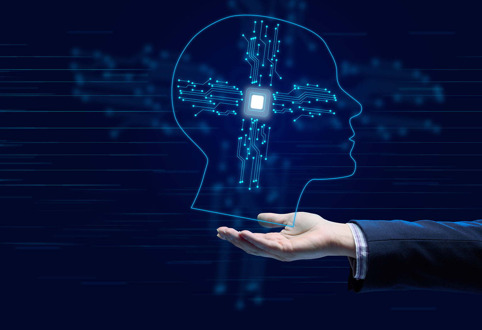 The concept of teaching artificial intelligence to various tasks, replacing human mental labor. Above the female hand is a luminous hologram of the head with connections